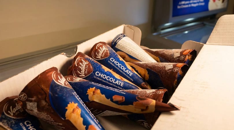 A box filled with Vadilal chocolate ice cream cones, ready to be served.